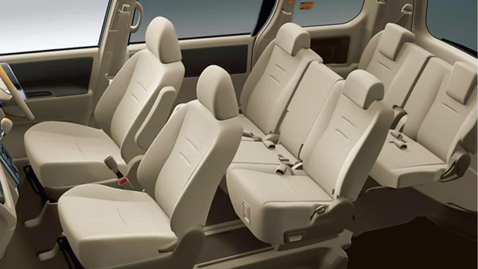 The Toyota Innova Crysta has roomy beige seats, so it's a relaxing ride for families and groups booking cabs in Madurai.