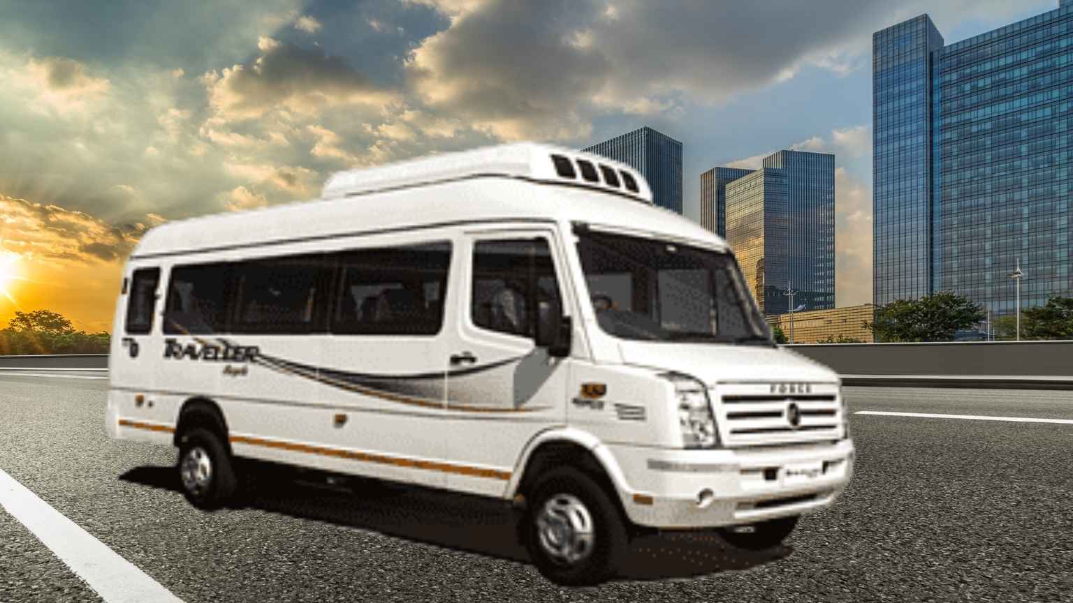 A White Force Tempo Traveller van drives down a city street as the sun sets. It's a great option for group cab bookings in Madurai. And yes, it has air conditioning.