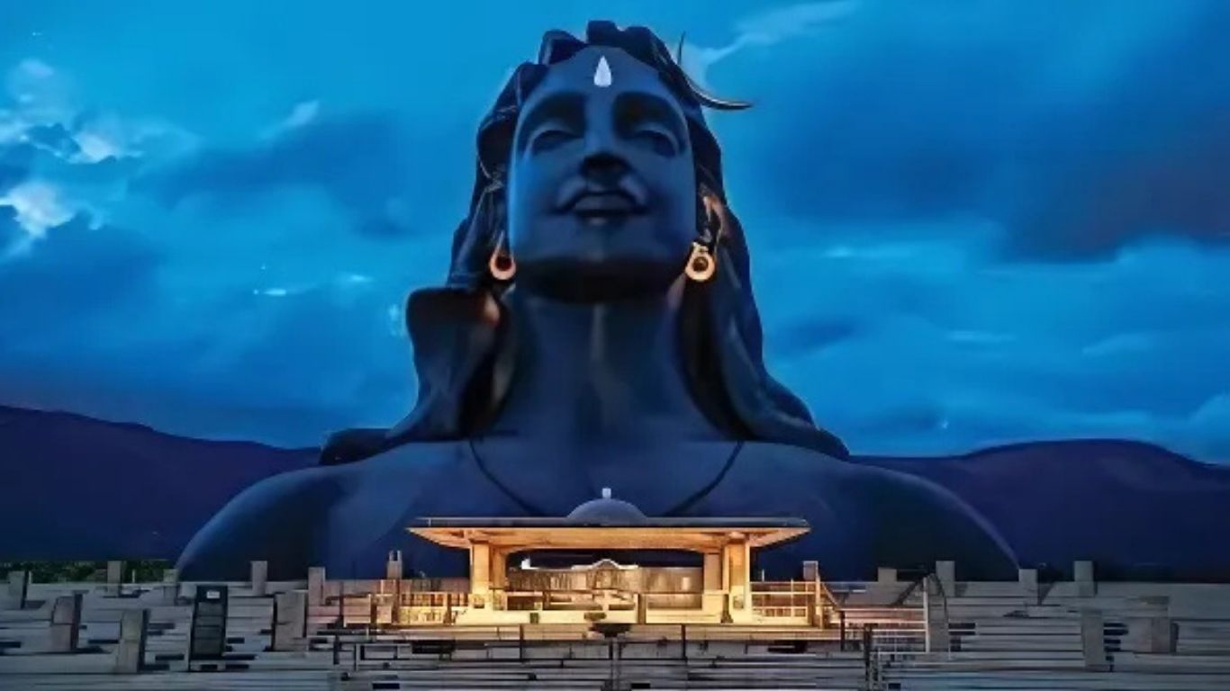 The Adiyogi Shiva statue is at the Isha Yoga Center near Coimbatore. If you're planning a cab ride from Madurai to Isha, it's a great place to visit.